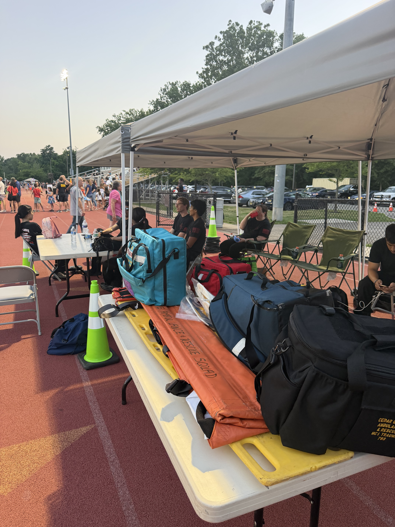 Cedar Grove EMS standby equipment staged on a table at a Fourth of July event