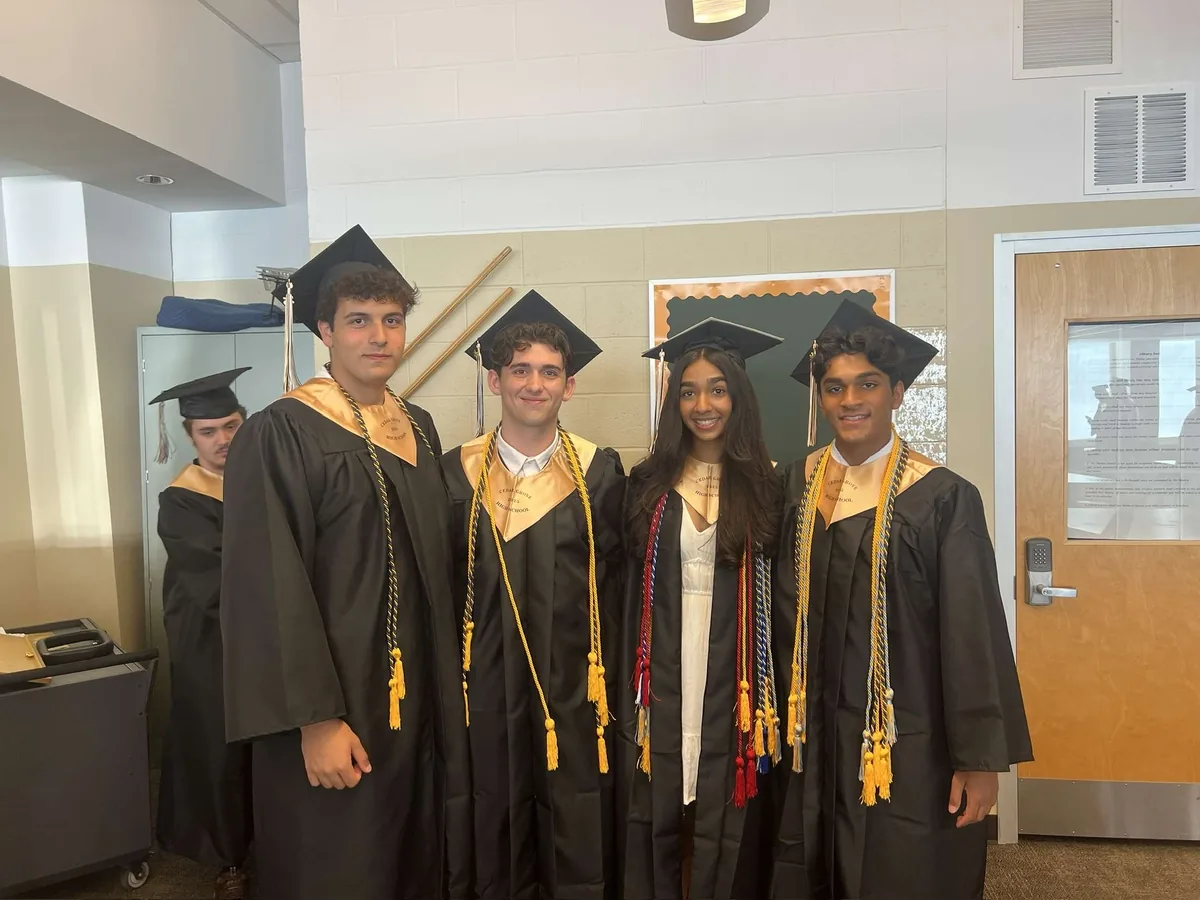 Members marking a graduation milestone.